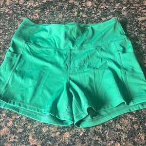 Puma green athletic  bike shorts size large